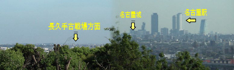 小牧山頂、木々の間から撮影。