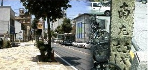 国道１９号線、金山新橋の交叉点の南西角に建っている。 ここより左折して岩塚、万場、神守、津島、佐屋を経て木曽川の渡し場に 至るのが佐屋街道である。写真は交叉点から西を見る脇往還：佐屋街道