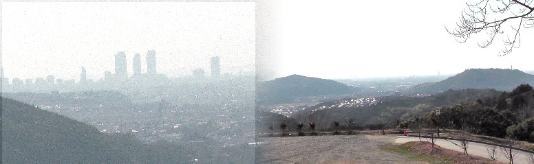 定光寺展望台から名古屋市内の遠望（右）。左は駅前の高層ビルを撮る。